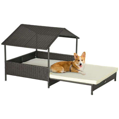 Elevated dark rattan-style dog bed with hinged roof and removable cream cushion