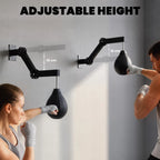 Wall-mounted speed bag with adjustable height arm and black hanging punch bag