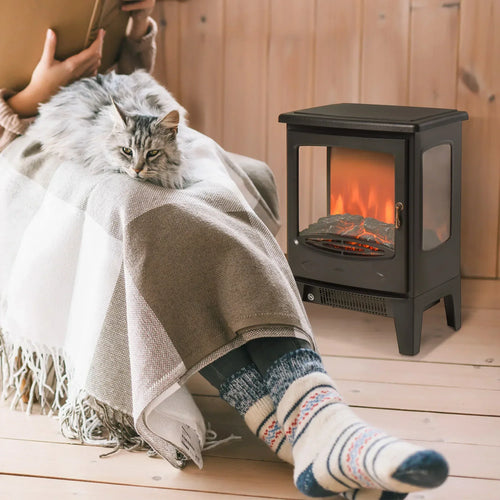 Black freestanding electric fireplace heater, glowing flame visible through front glass