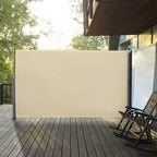Cream retractable privacy screen with gray frame installed on patio balcony walkway