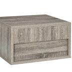 Grey wood-effect floating bedside table showing drawer panel and side cabinet body