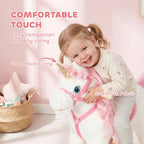 Plush unicorn rocking horse, white body with pink mane and soft fabric padding