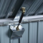 Black and silver storage shelter lid latch mechanism with mounting bracket