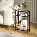 Black 3-tier narrow end table with tempered glass top and open shelves for decor.