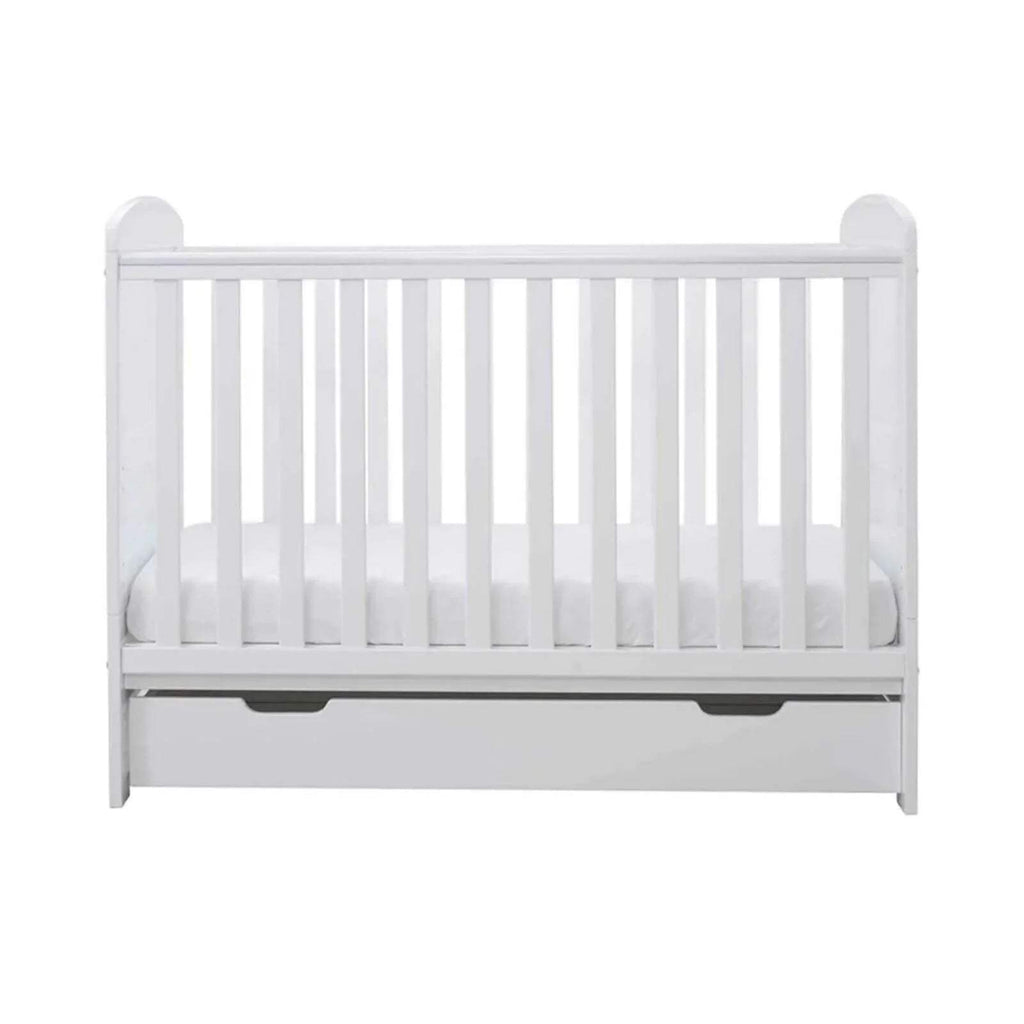 White mini cot bed end view with vertical rails and under-drawer panel