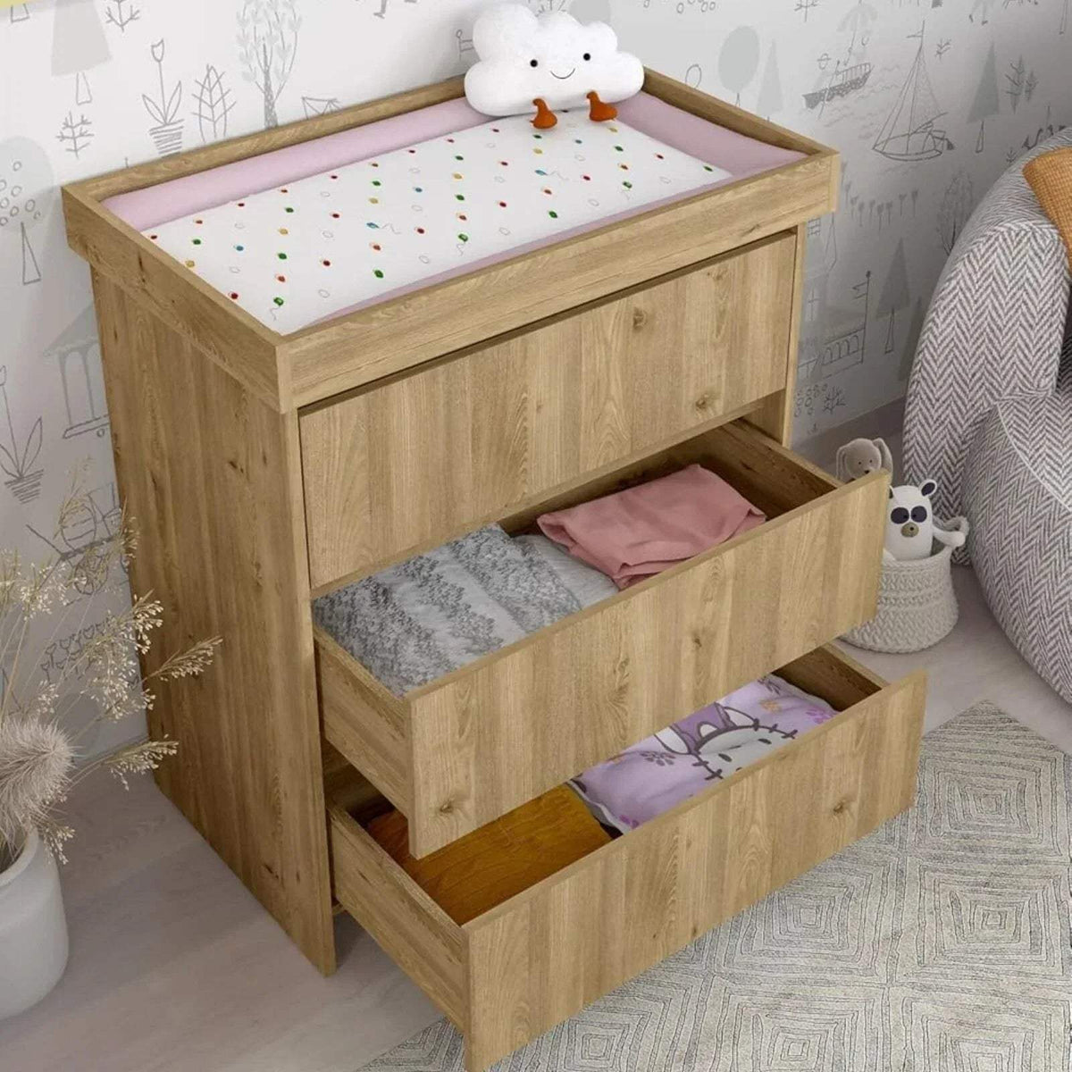 Light oak changing unit with padded changing surface and two open storage shelves