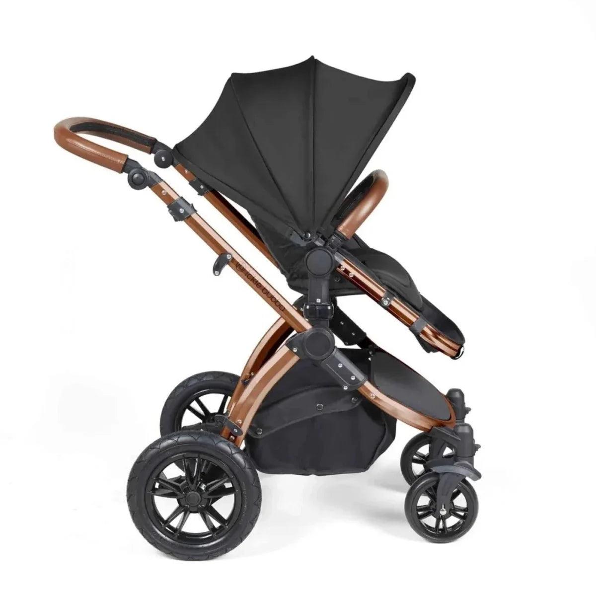 Black stroller with bronze frame accents and a full-size seat with canopy