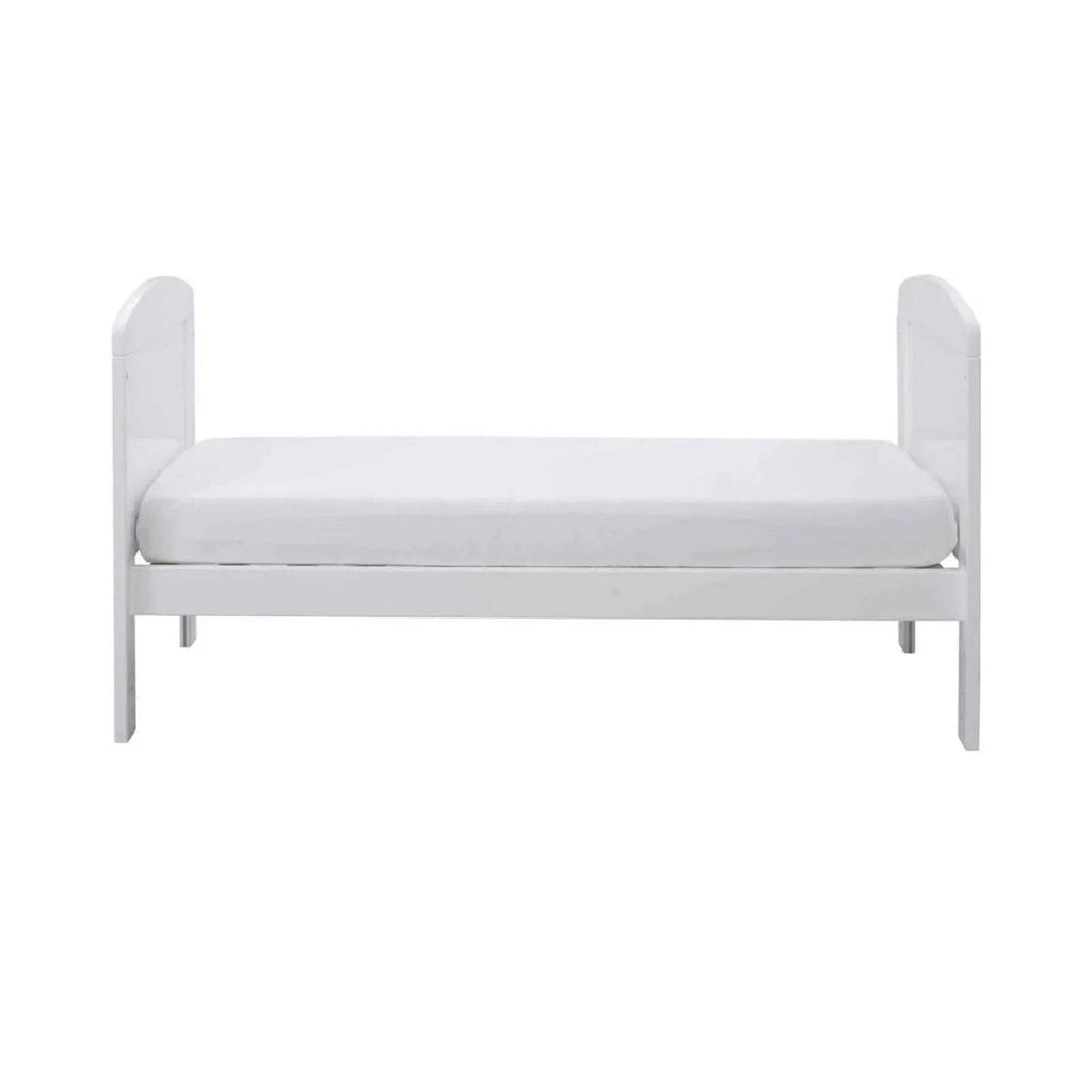 White mini cot bed with fitted mattress and smooth top cover