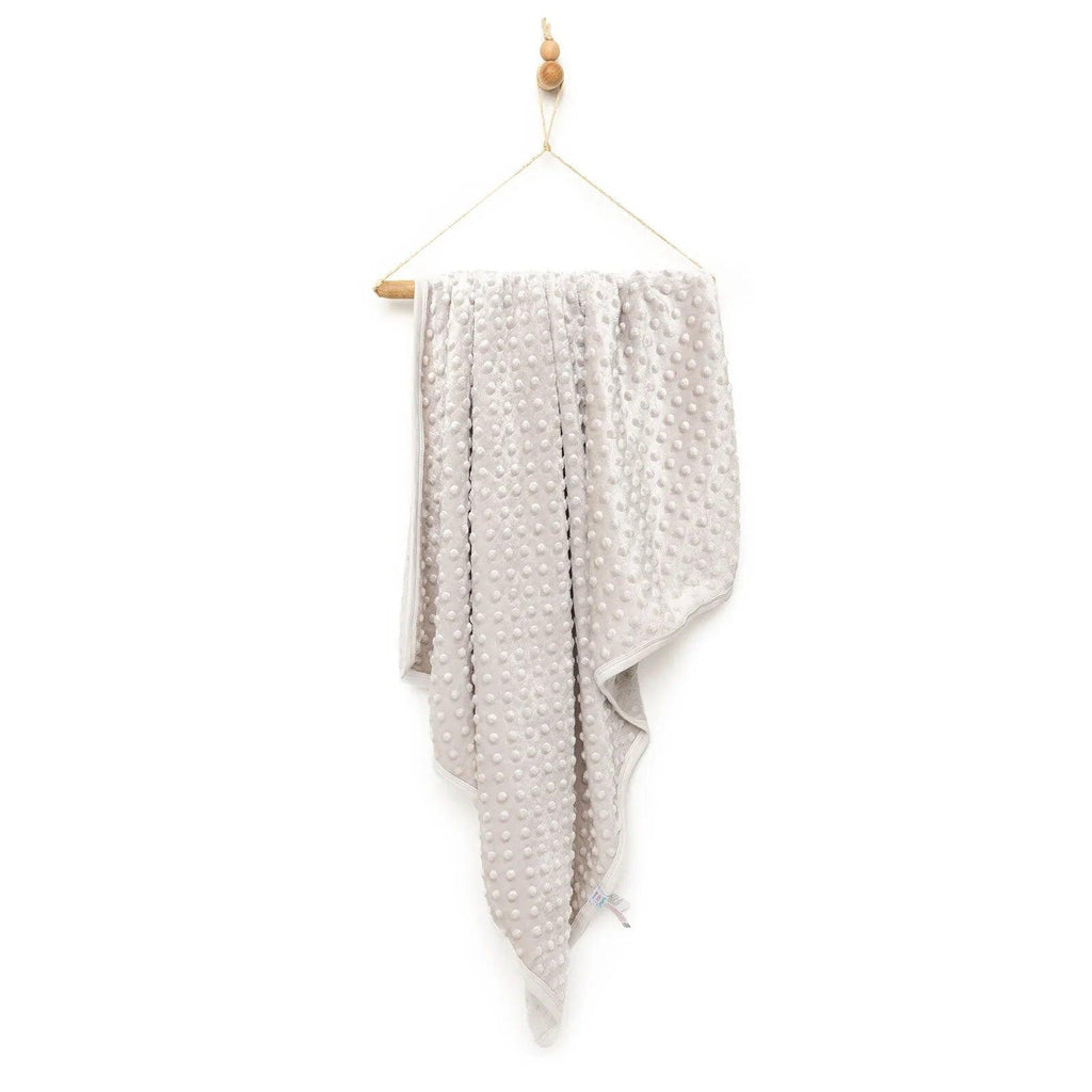 Beige wellsoft fleece baby blanket with allover dot pattern, one size