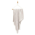 Beige wellsoft fleece baby blanket with allover dot pattern, one size