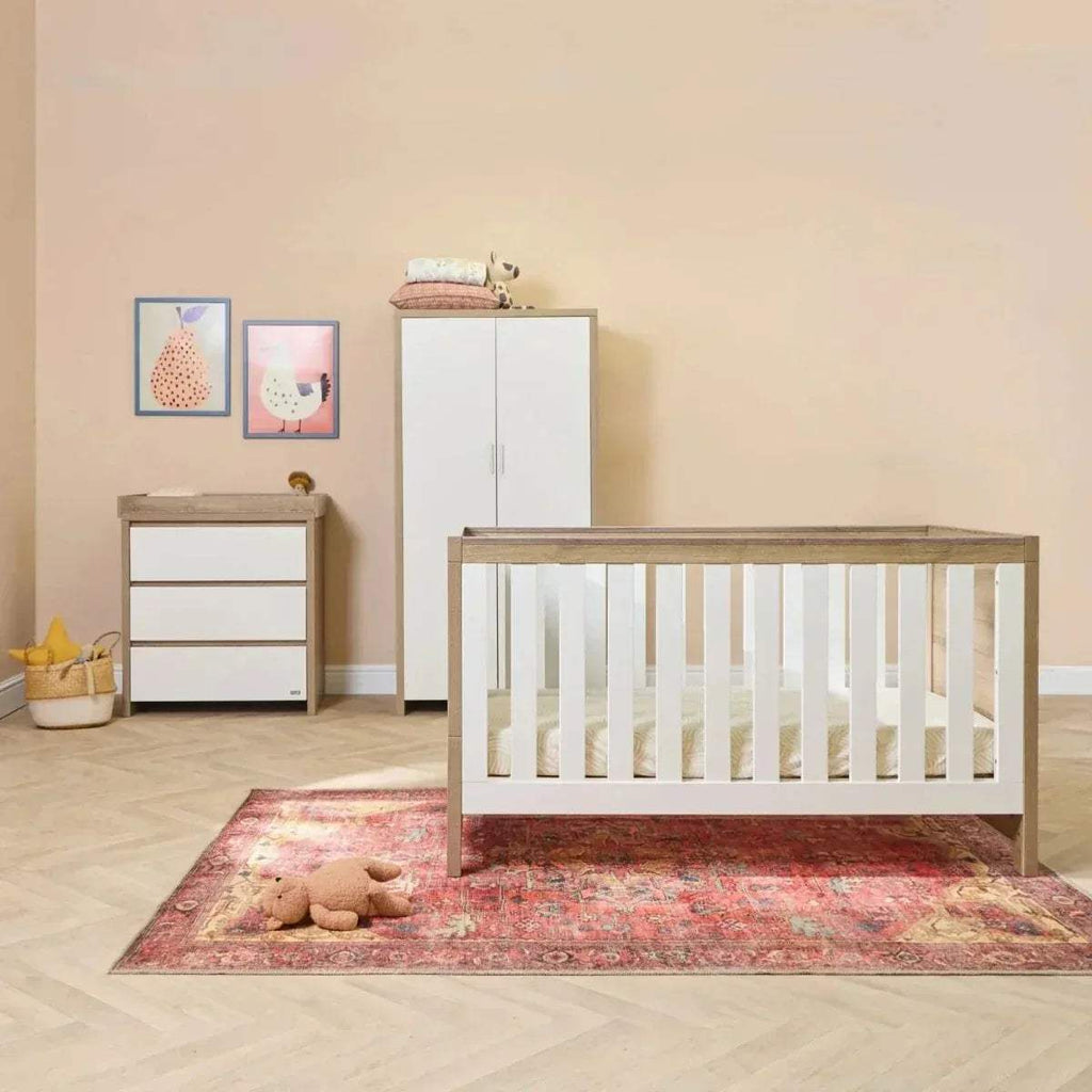 Kids room set: white wardrobe, light oak cot bed, and matching drawer cabinet.