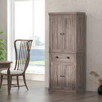 Freestanding kitchen pantry cabinet with two upper doors, two lower doors, and drawer