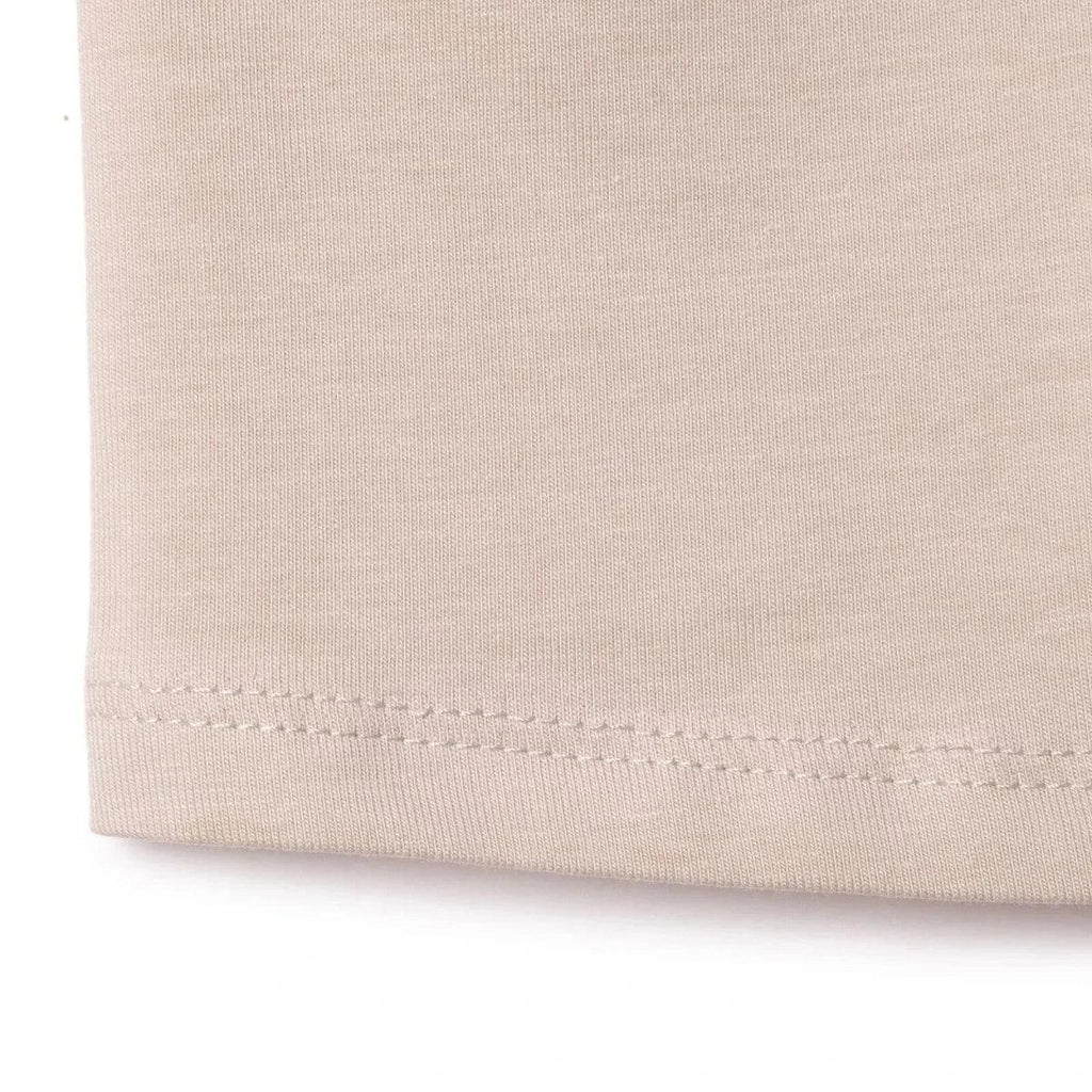 Mink jersey baby shorts hem with stitched edge