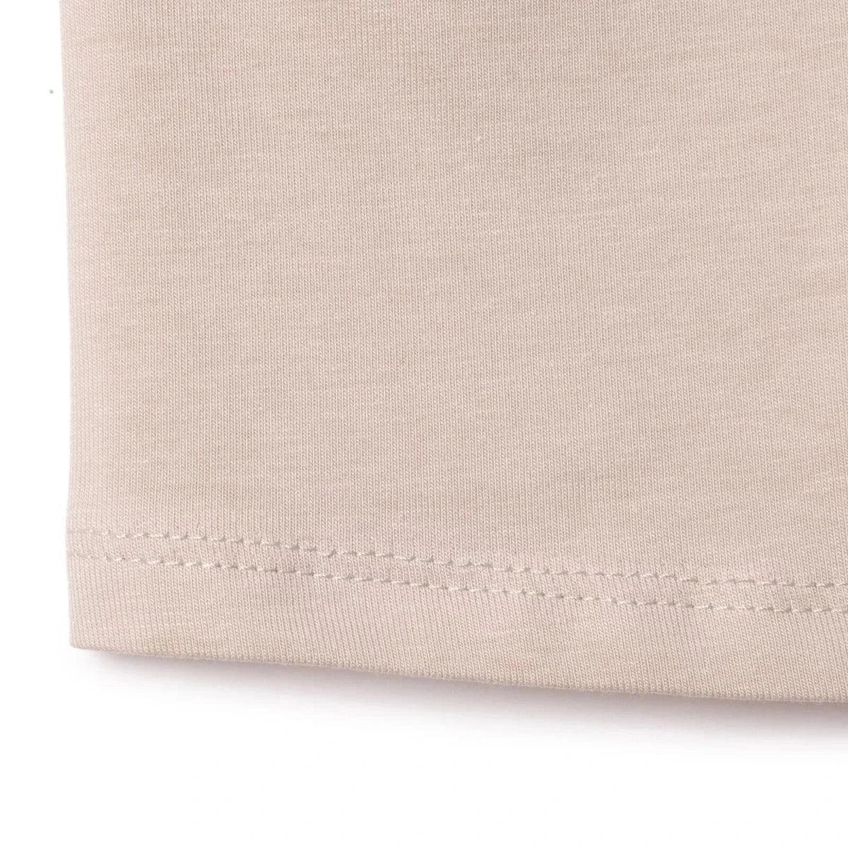 Mink jersey baby shorts hem with stitched edge