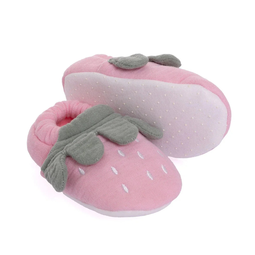 Pink baby booties with gray leaf appliqués and dotted soles