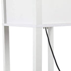 White lamp frame and shelf with black power cord entering the unit