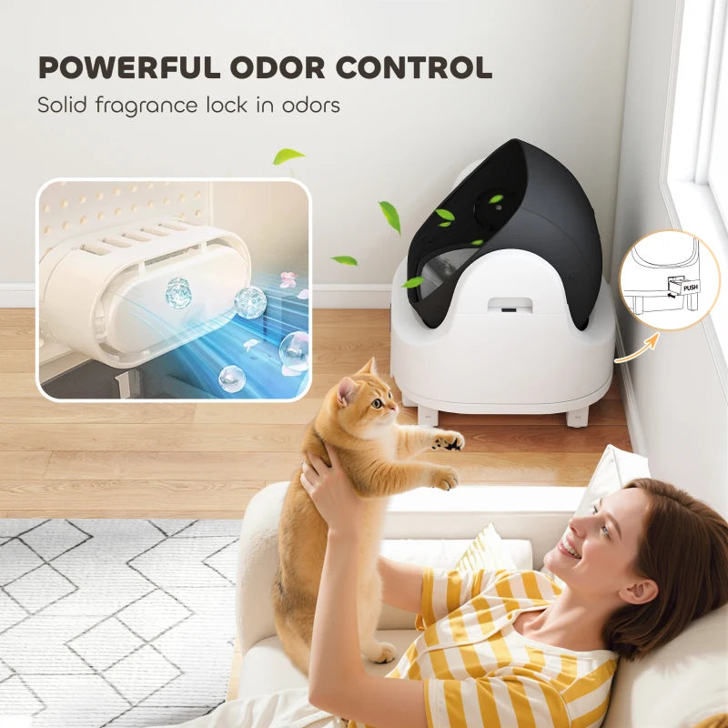 White automatic self-cleaning cat litter tray for odor control, shown with cat inside.