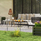 Black metal decorative fence panels with diamond lattice, installed along a patio garden