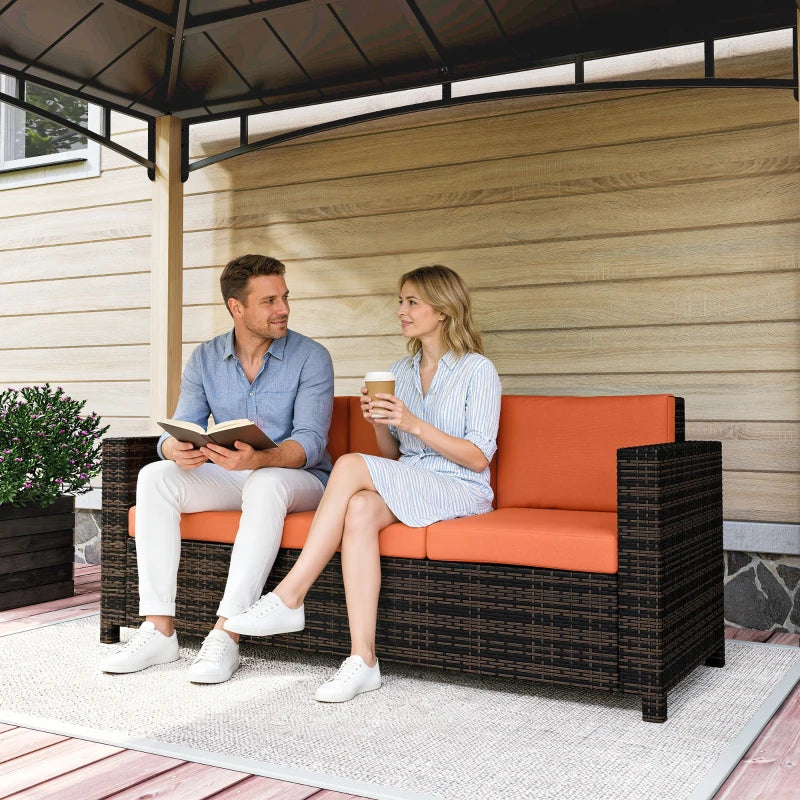 Orange outdoor rattan sofa with cushioned seat, backrest, and armrests