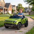 Green kids ride-on car with smiling child driving outdoors on a driveway