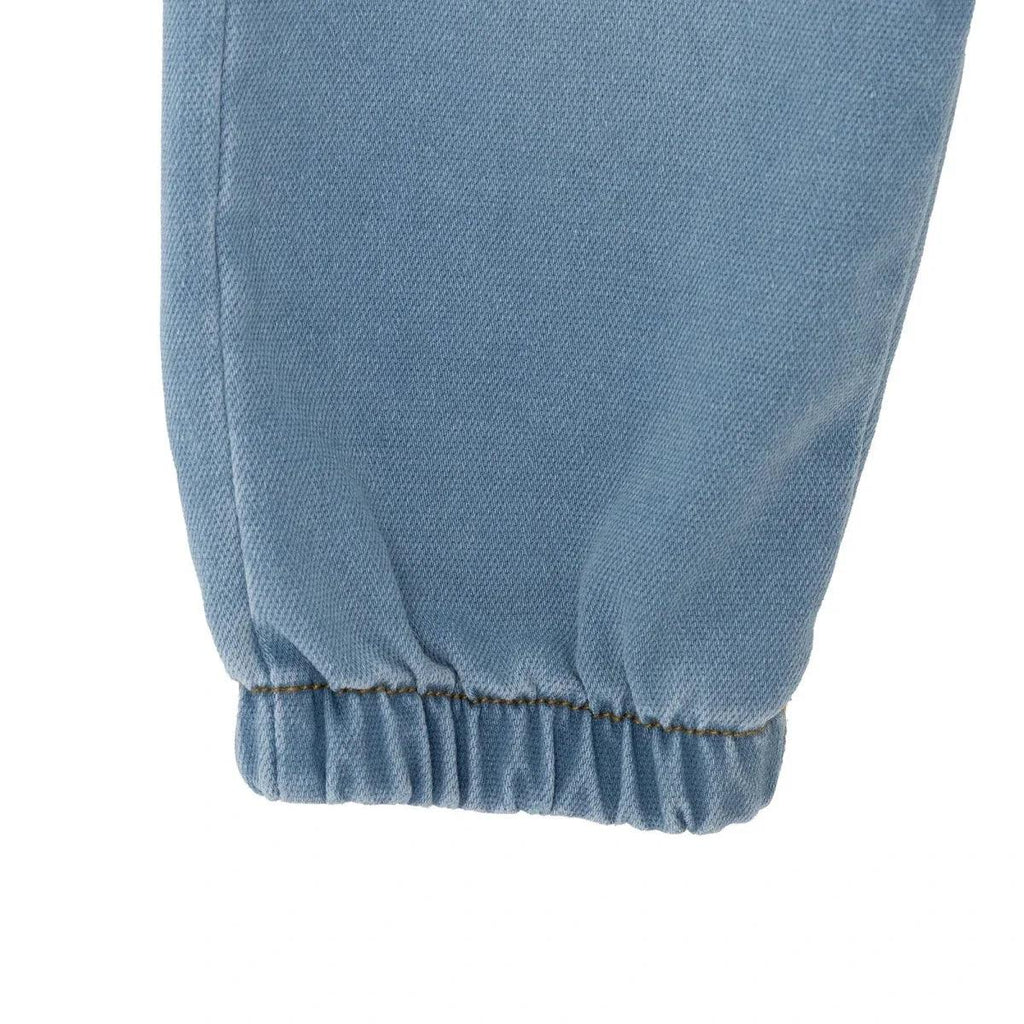 Light blue denim baby trousers with elasticated hem cuffs