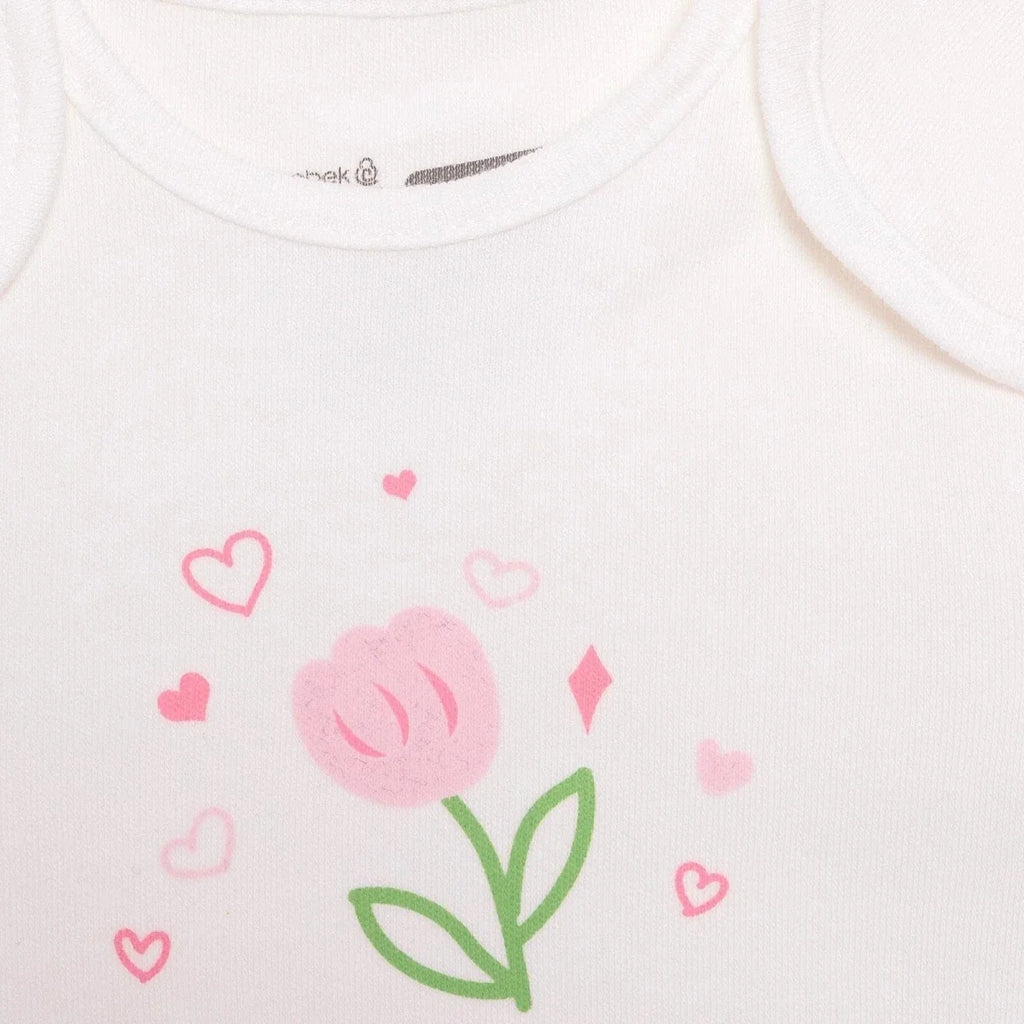 White bodysuit chest close-up with pink tulip and heart graphic