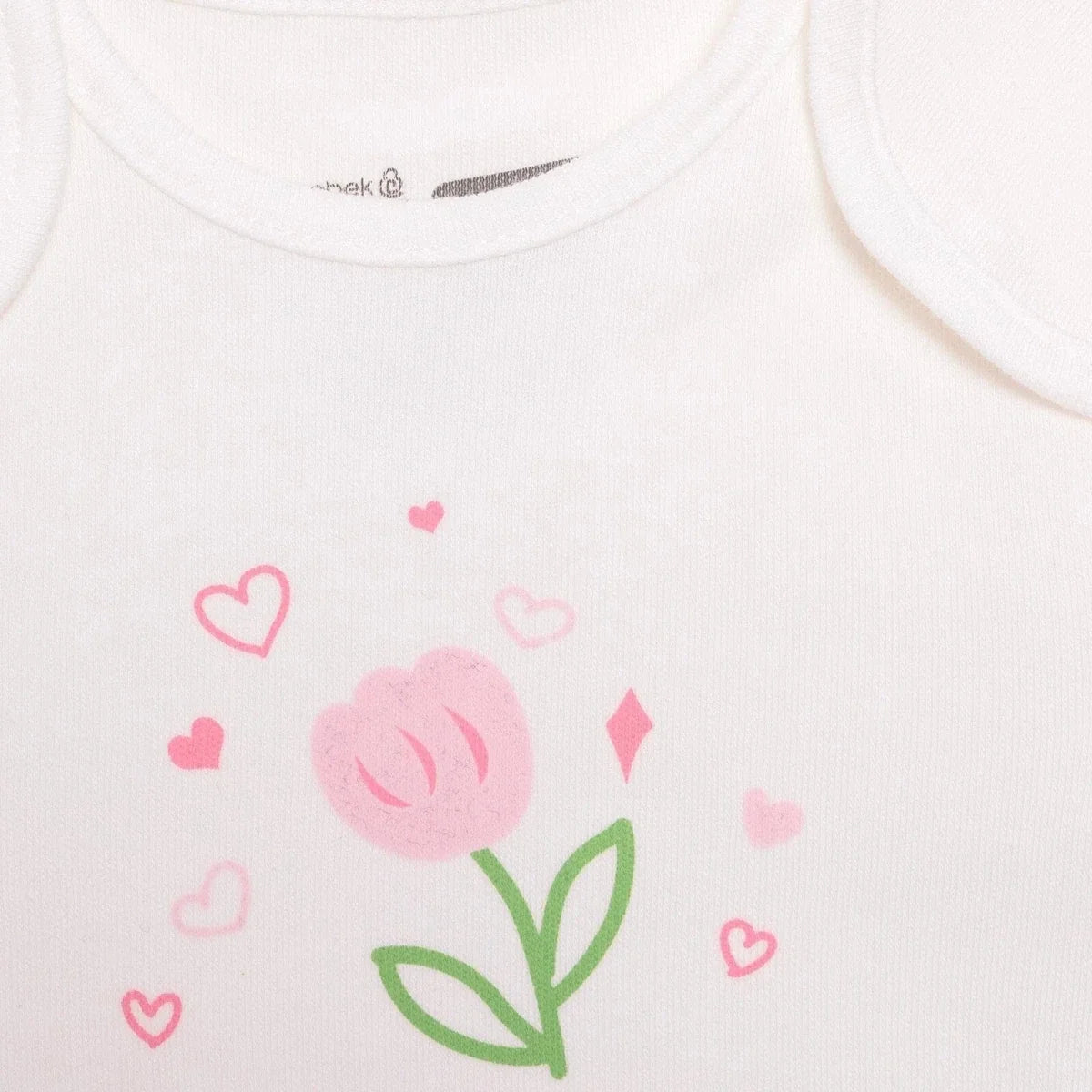 White bodysuit chest close-up with pink tulip and heart graphic