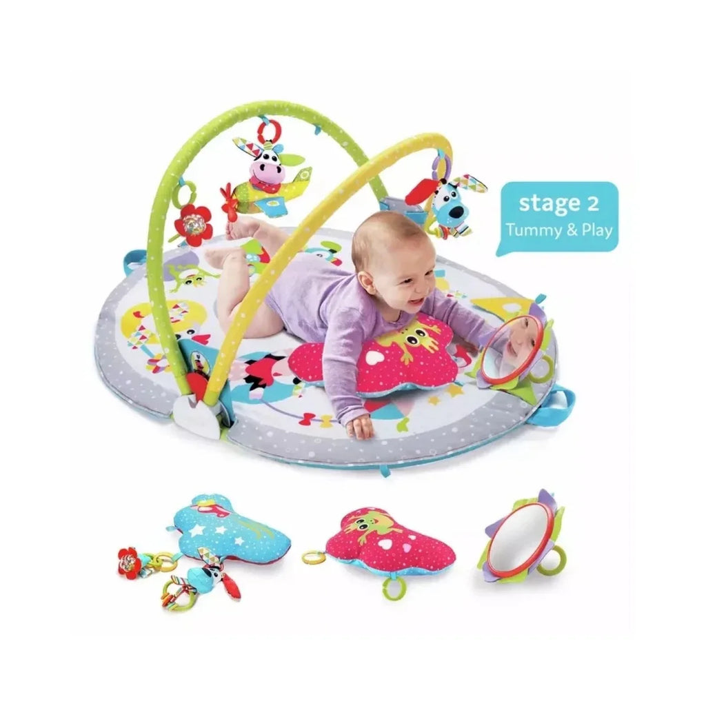 Tummy-time baby play mat with arched frame, dangling rings, and sensory toy attachments