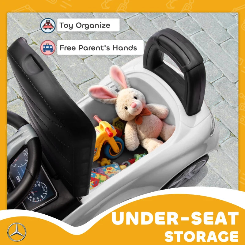 White ride-on car walker with under-seat storage compartment and open organizer space