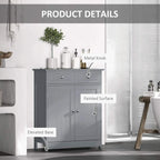Grey bathroom cabinet details: metal knobs, painted surface, elevated base