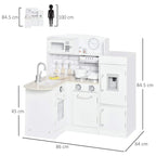 White kids play kitchen set with sink, stove, microwave panel, and fridge cabinet doors