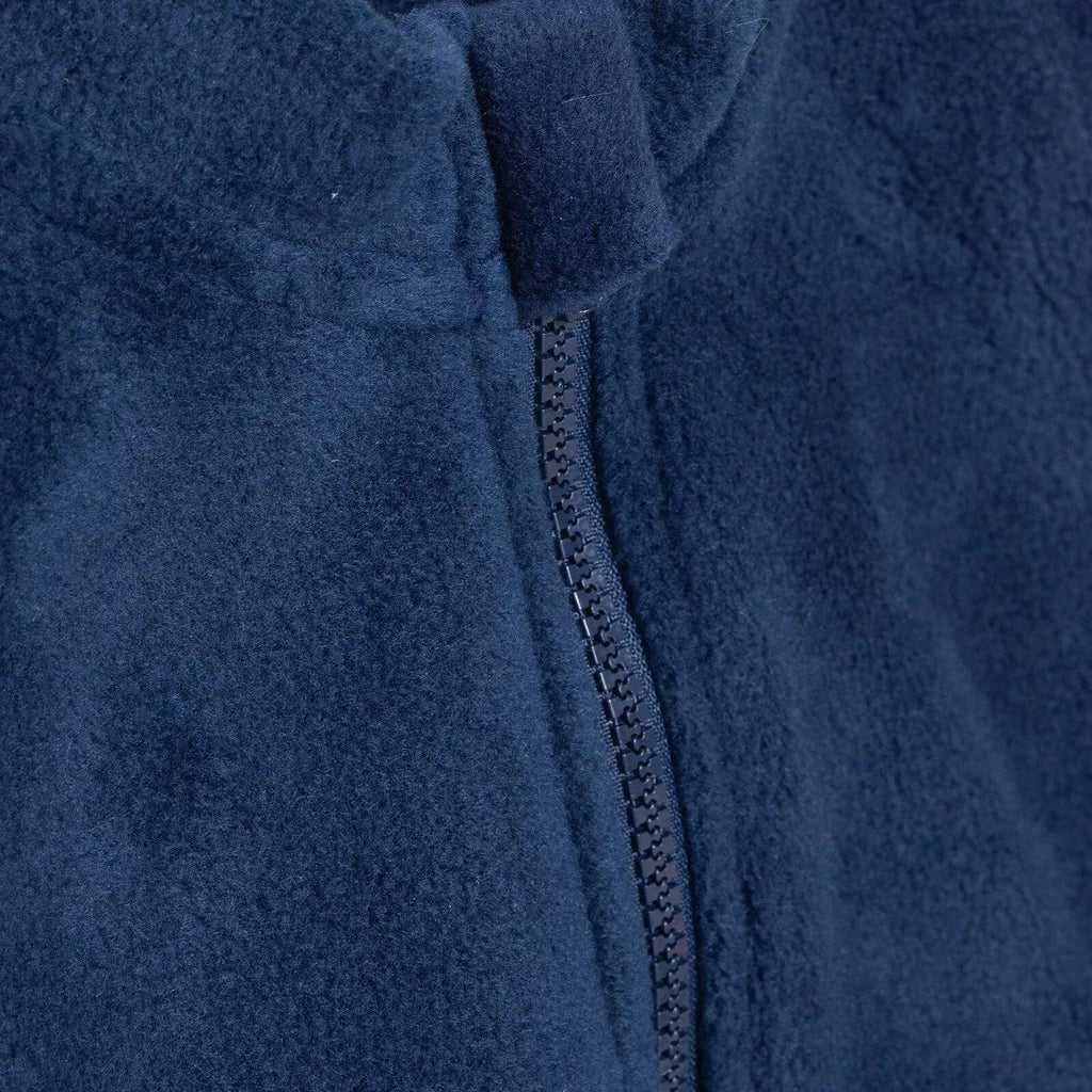 Navy blue fleece gilet close-up of front zip and funnel neck