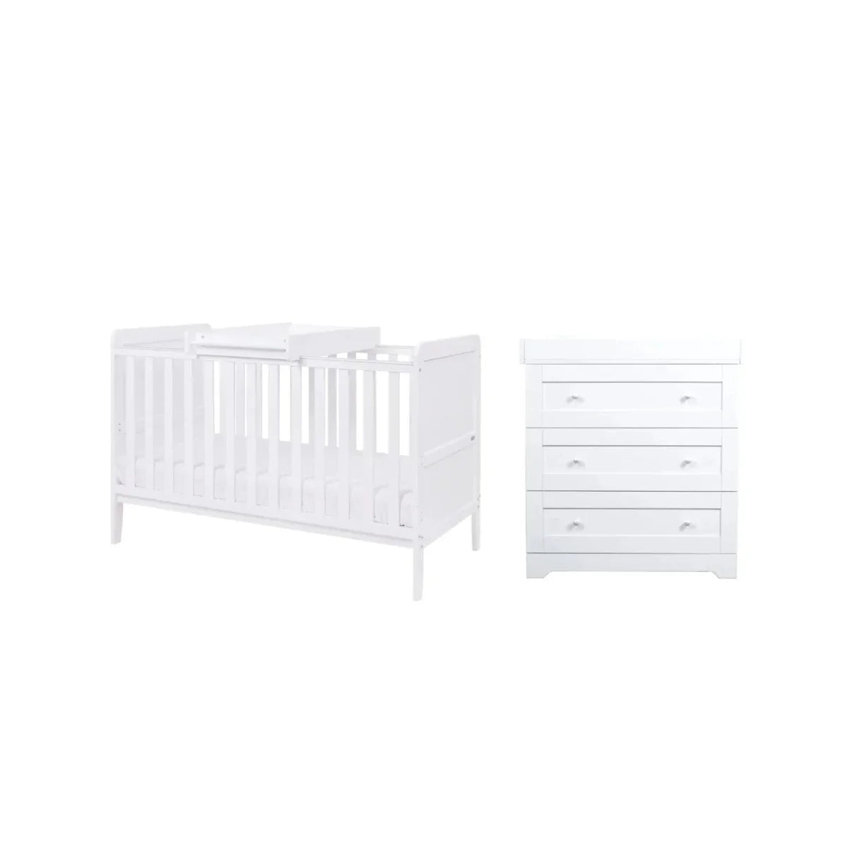 White cot bed with slatted sides and matching dresser with three drawer tiers