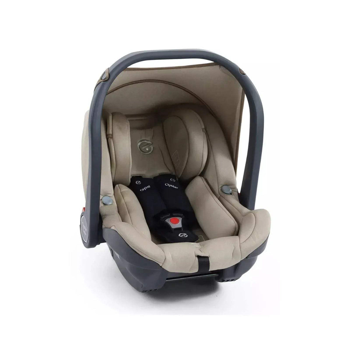 Buttermilk infant car seat with soft insert, five-point harness, and carry handle frame