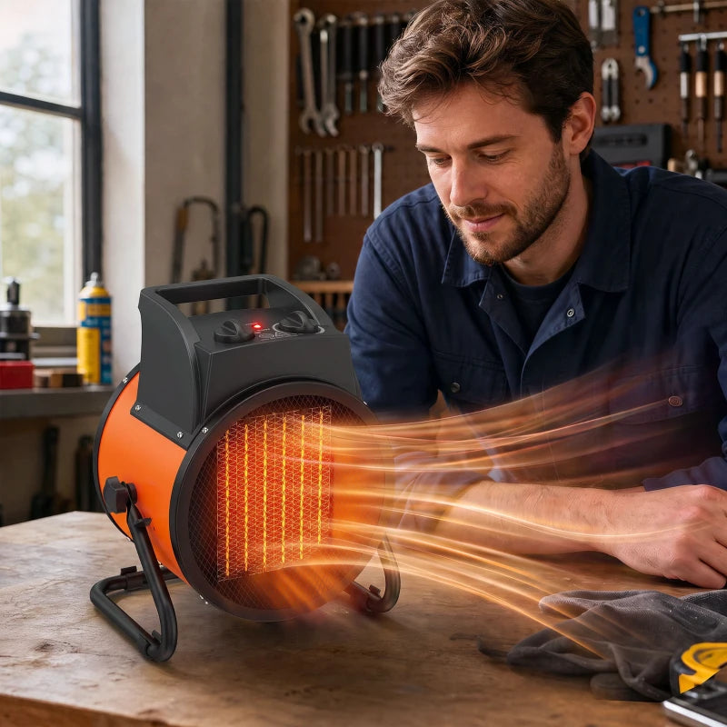 Orange and black portable heater with glowing ceramic grille and front control dials