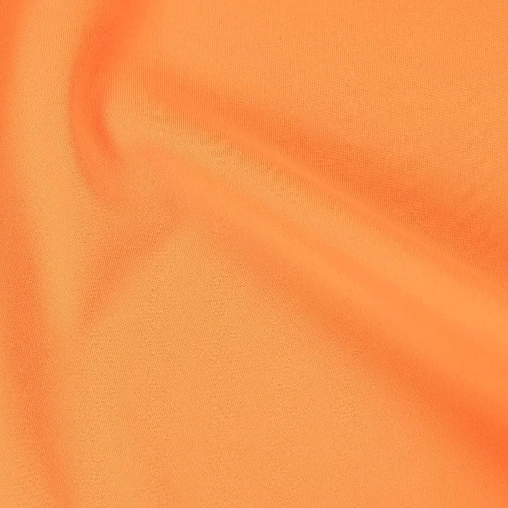 Neon orange swim top fabric texture close-up.
