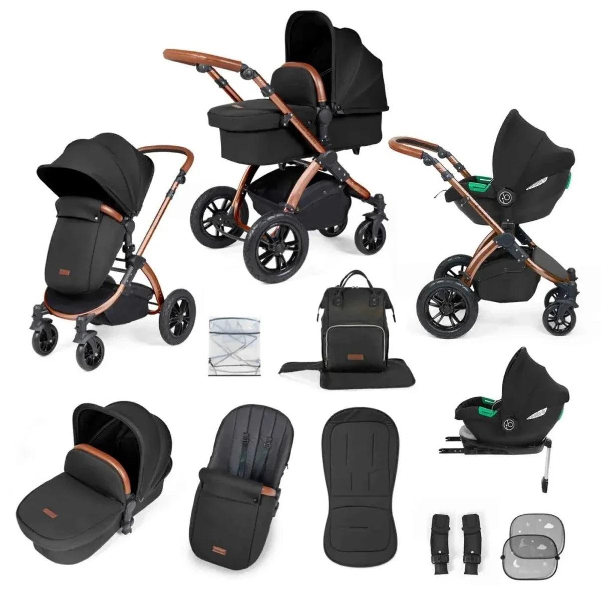 Stroller travel system set in black with bronze handle and tan details, plus car seat and extras