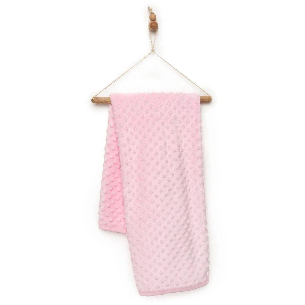 Pink baby fleece blanket, one-size, hanging view with raised dot pattern.