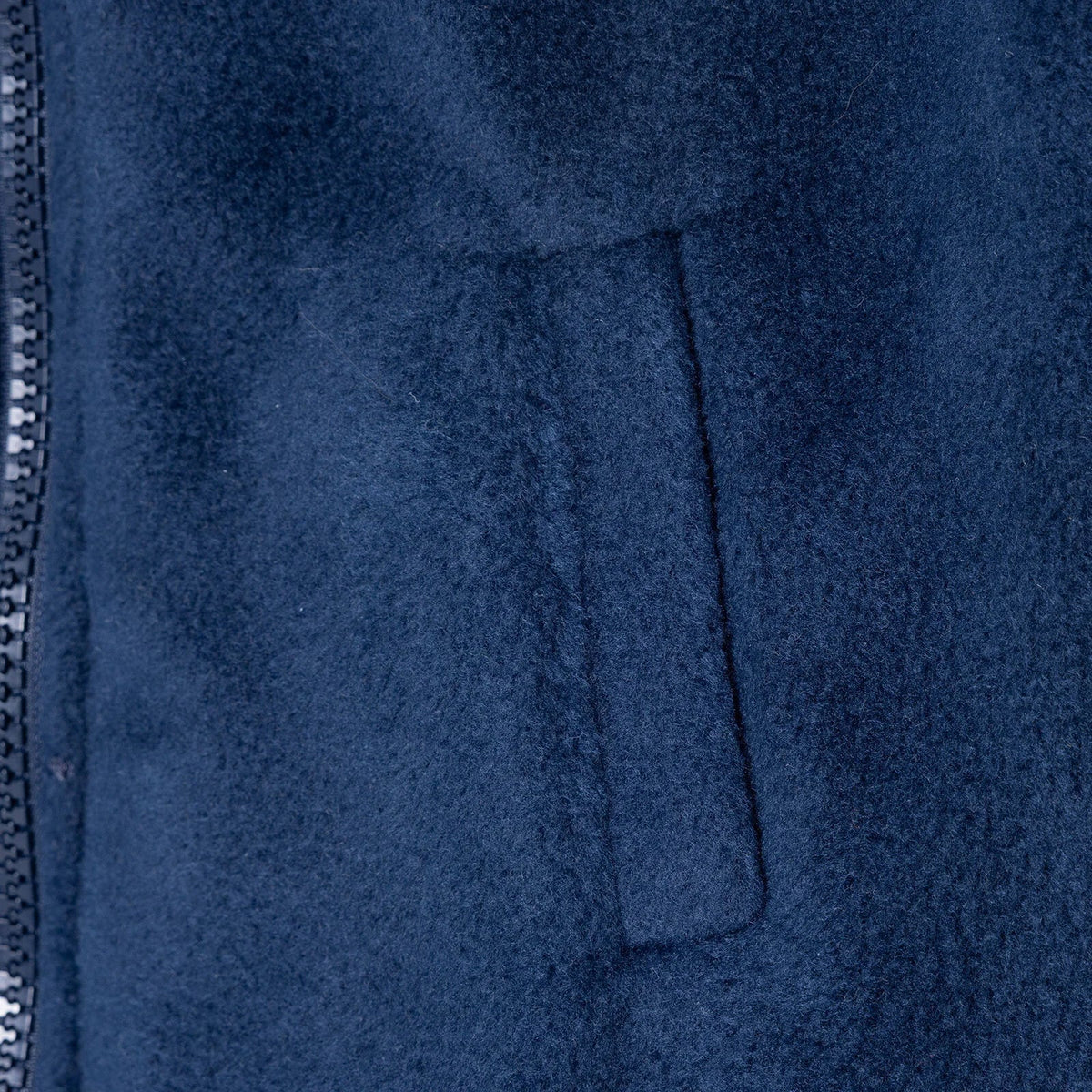 Navy blue fleece gilet close-up of pocket panel