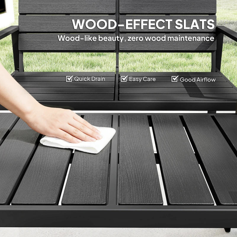 Close-up of black slatted tabletop with quick-drain surface for easy outdoor cleaning.