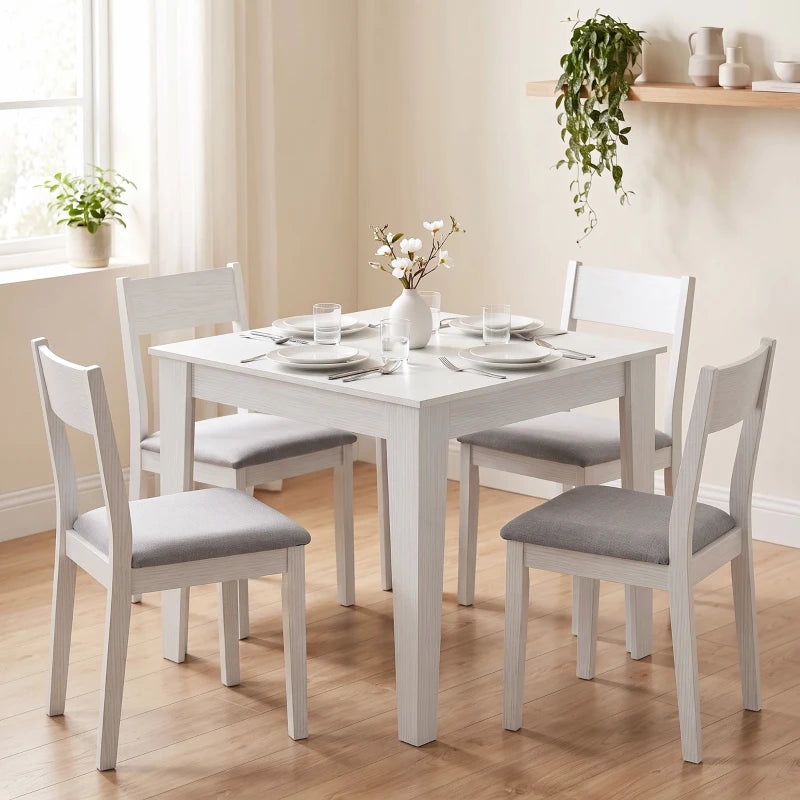 White square dining table with smooth surface and four straight legs.