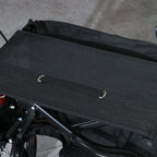 Black fabric rollator seat and backrest with a securing strap