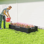 Dark grey galvanised steel planter filled with colorful flowers