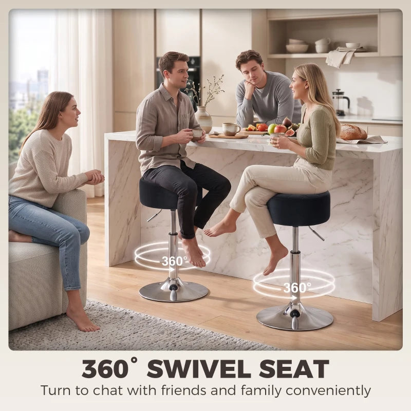 Black swivel bar stool seats with chrome bases for bar-height dining