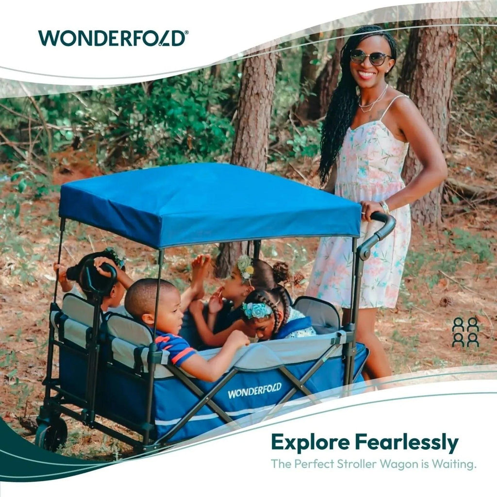 Sapphire navy quad stroller wagon with canopy carrying children outdoors