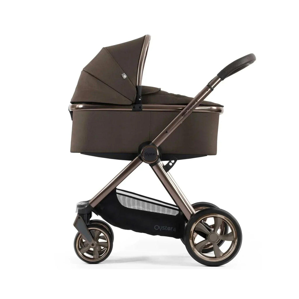 Chocolate velvet carrycot and stroller with canopy, side view and wheels