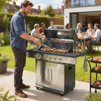 Silver BBQ grill with open lid and sausages cooking on the grates
