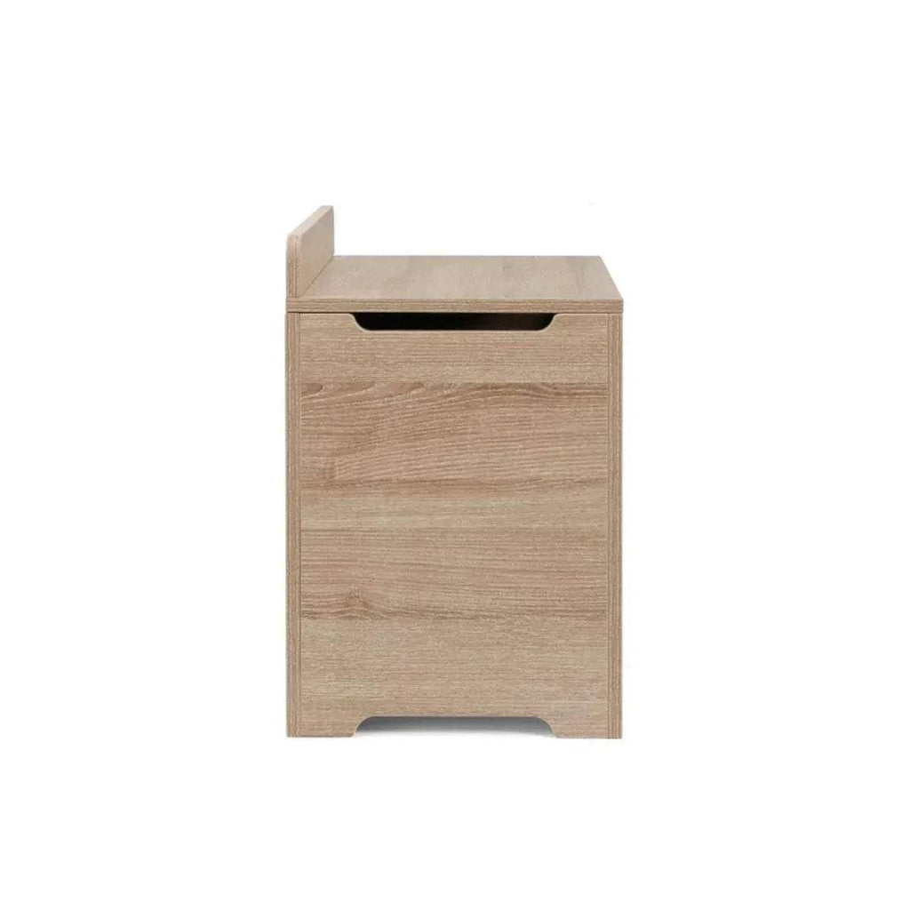 Closed oak wooden toy box with top lid and front handhold slot