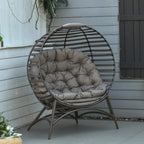 Egg chair with gray cushion in dark frame with side pocket on the left