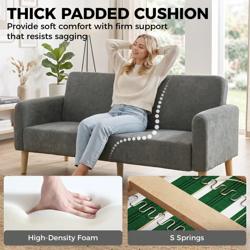 Grey velvet sofa with deep, thick seat cushion and supportive backrest